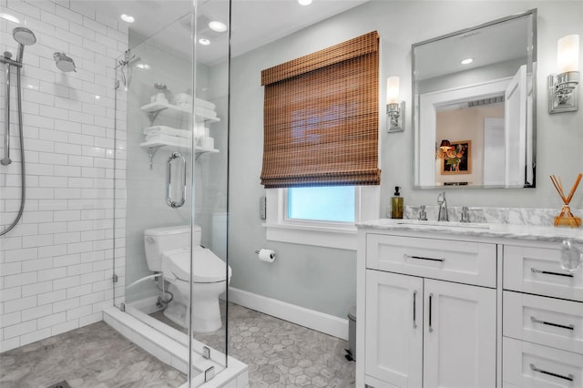 221 13th Ave NE, Saint Petersburg, FL 33701 - bathroom featuring toilet, a shower stall, vanity, recessed lighting, and baseboards