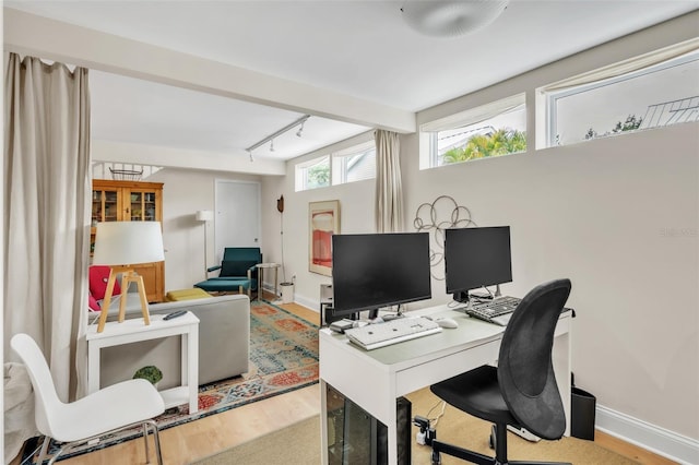 221 13th Ave NE, Saint Petersburg, FL 33701 - office with wood finished floors, baseboards, and rail lighting