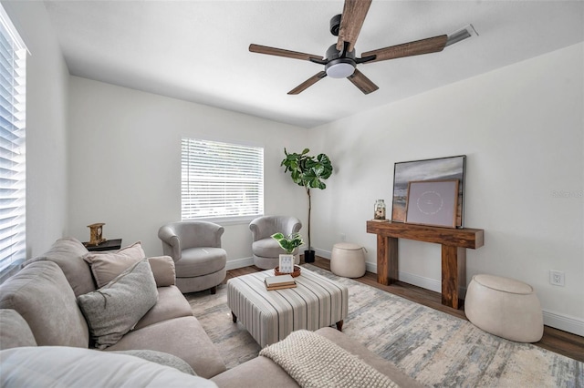 2078 Madrid Ct N, Clearwater, FL 33763 - living room with ceiling fan, light wood-type flooring, and baseboards