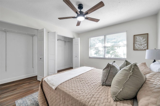 2078 Madrid Ct N, Clearwater, FL 33763 - bedroom featuring wood finished floors, a textured ceiling, ceiling fan, and baseboards
