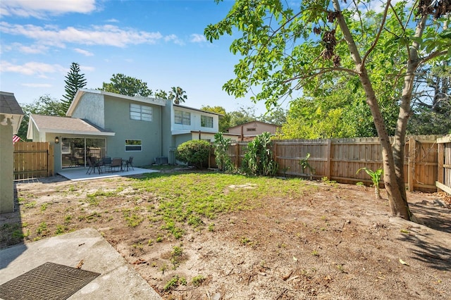 2078 Madrid Ct N, Clearwater, FL 33763 - fenced backyard with a patio