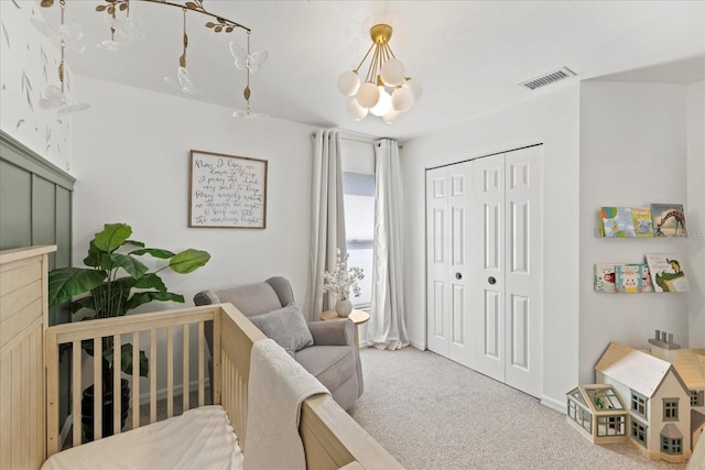 1914 Elk Spring Dr, Brandon, FL 33511 - carpeted bedroom featuring a chandelier and a closet