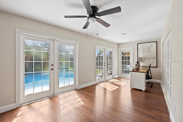 1914 Elk Spring Dr, Brandon, FL 33511 - entryway with french doors, wood finished floors, a ceiling fan, baseboards, and a textured ceiling
