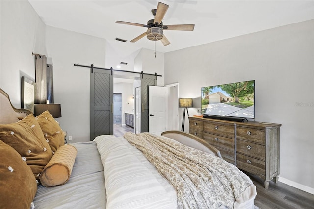 1914 Elk Spring Dr, Brandon, FL 33511 - bedroom featuring a barn door, wood finished floors, a high ceiling, baseboards, and ceiling fan