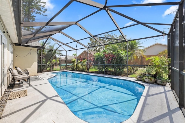 1914 Elk Spring Dr, Brandon, FL 33511 - swimming pool featuring a fenced backyard, a patio, and glass enclosure