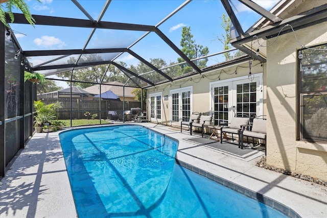 1914 Elk Spring Dr, Brandon, FL 33511 - view of swimming pool with french doors, a patio, and glass enclosure