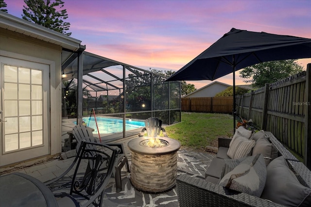 1914 Elk Spring Dr, Brandon, FL 33511 - view of patio / terrace with a fire pit and glass enclosure