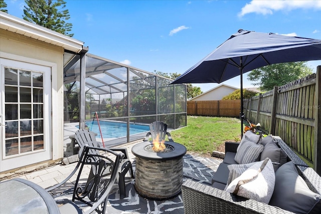 1914 Elk Spring Dr, Brandon, FL 33511 - view of patio with an outdoor fire pit and a lanai
