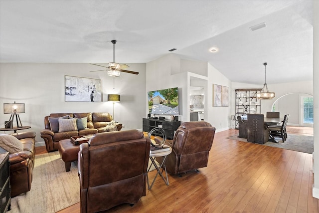 1914 Elk Spring Dr, Brandon, FL 33511 - living area with lofted ceiling, hardwood / wood-style flooring, a chandelier, ceiling fan, and baseboards