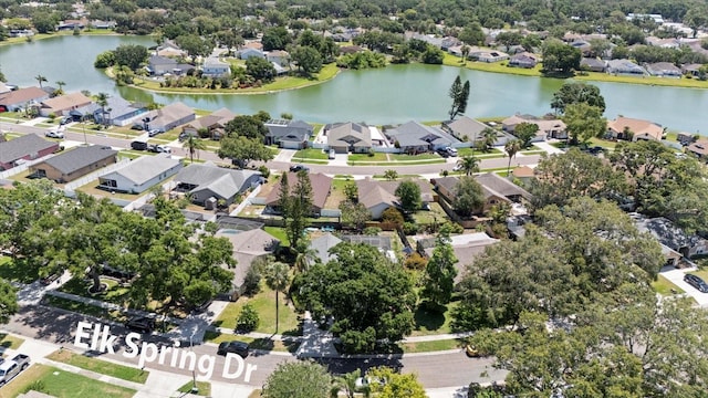 1914 Elk Spring Dr, Brandon, FL 33511 - aerial view of property and surrounding area with nearby suburban area and a large body of water