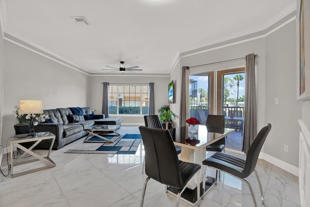 4333 Bayside Village Dr Unit 110, Tampa, FL 33615 - dining area with light marble finish flooring, crown molding, baseboards, and ceiling fan