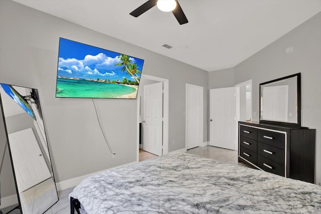 4333 Bayside Village Dr Unit 110, Tampa, FL 33615 - bedroom with baseboards and a ceiling fan
