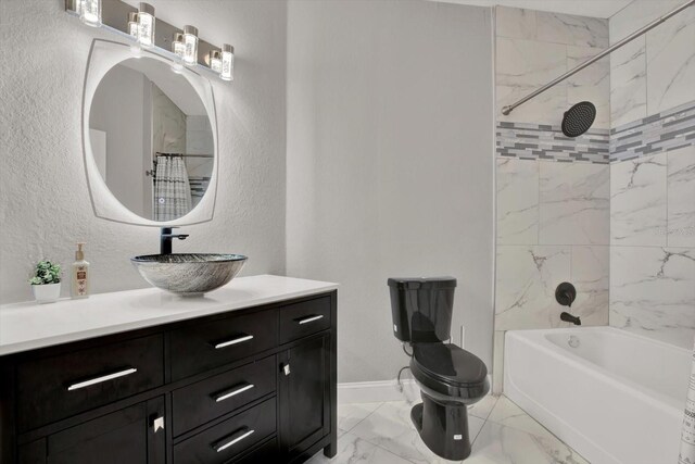 4333 Bayside Village Dr Unit 110, Tampa, FL 33615 - full bathroom featuring marble look tiles, vanity, toilet, shower / bathtub combination with curtain, and baseboards