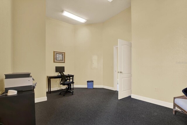 4333 Bayside Village Dr Unit 110, Tampa, FL 33615 - office area with high vaulted ceiling and baseboards