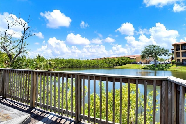 4333 Bayside Village Dr Unit 110, Tampa, FL 33615 - wooden deck with a water view