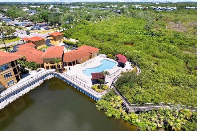 4333 Bayside Village Dr Unit 110, Tampa, FL 33615 - drone / aerial view of a pool area and a nearby body of water