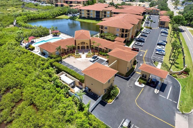 4333 Bayside Village Dr Unit 110, Tampa, FL 33615 - drone / aerial view of a large body of water and a pool
