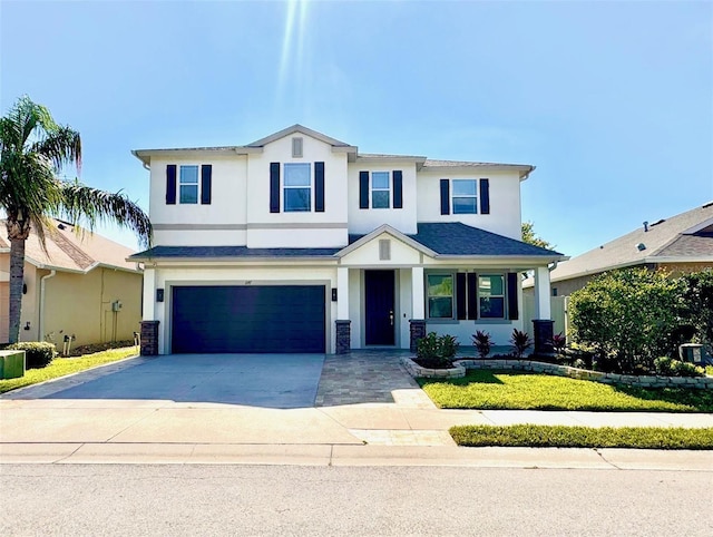 1147 Halapa Way, Trinity, FL 34655 - view of front of house featuring stucco siding, an attached garage, driveway, and a front yard
