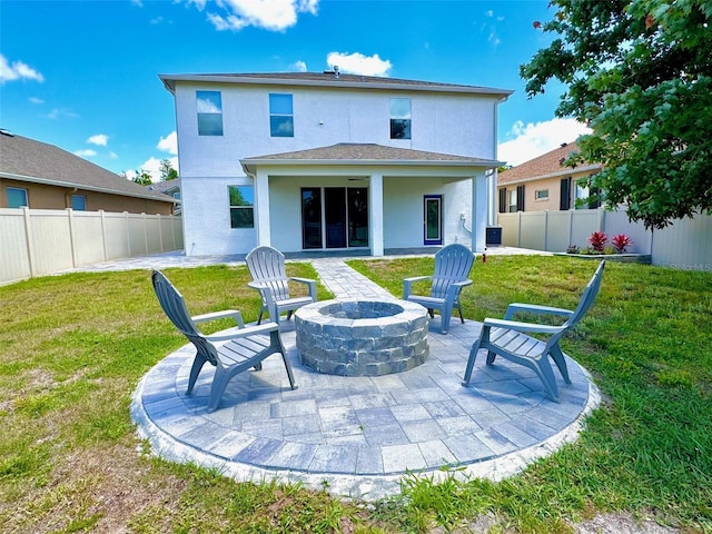 1147 Halapa Way, Trinity, FL 34655 - back of house with a patio, a fire pit, stucco siding, and cooling unit