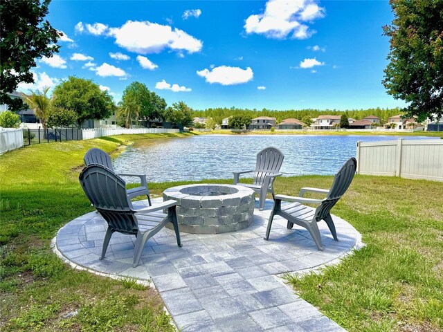 1147 Halapa Way, Trinity, FL 34655 - view of patio / terrace featuring a fire pit and a water view