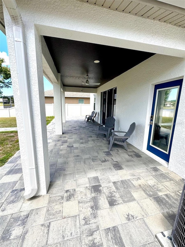 1147 Halapa Way, Trinity, FL 34655 - view of patio / terrace featuring fence and ceiling fan