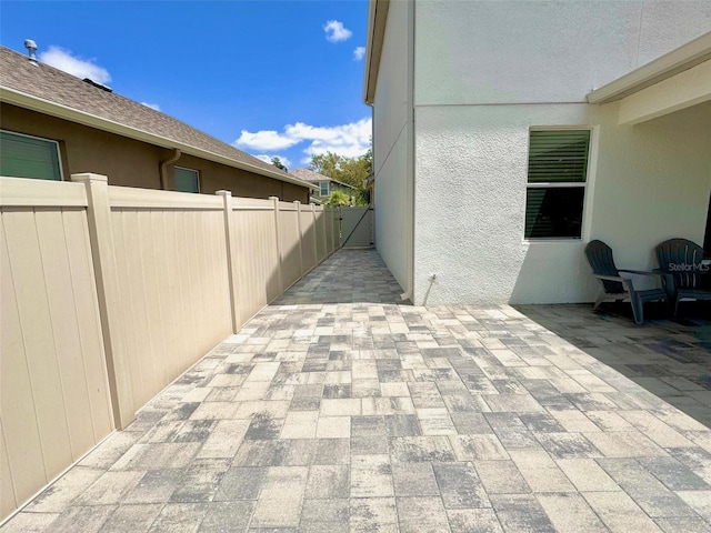 1147 Halapa Way, Trinity, FL 34655 - view of patio / terrace with fence