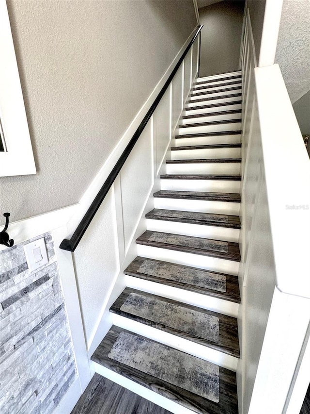 1147 Halapa Way, Trinity, FL 34655 - stairway featuring wood finished floors