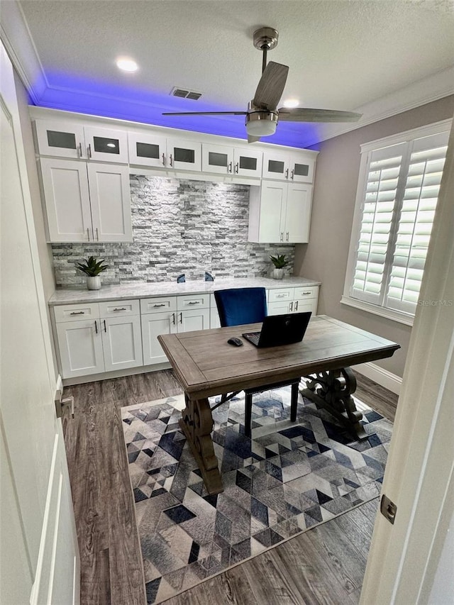 1147 Halapa Way, Trinity, FL 34655 - office area with wood finished floors, a ceiling fan, and a textured ceiling