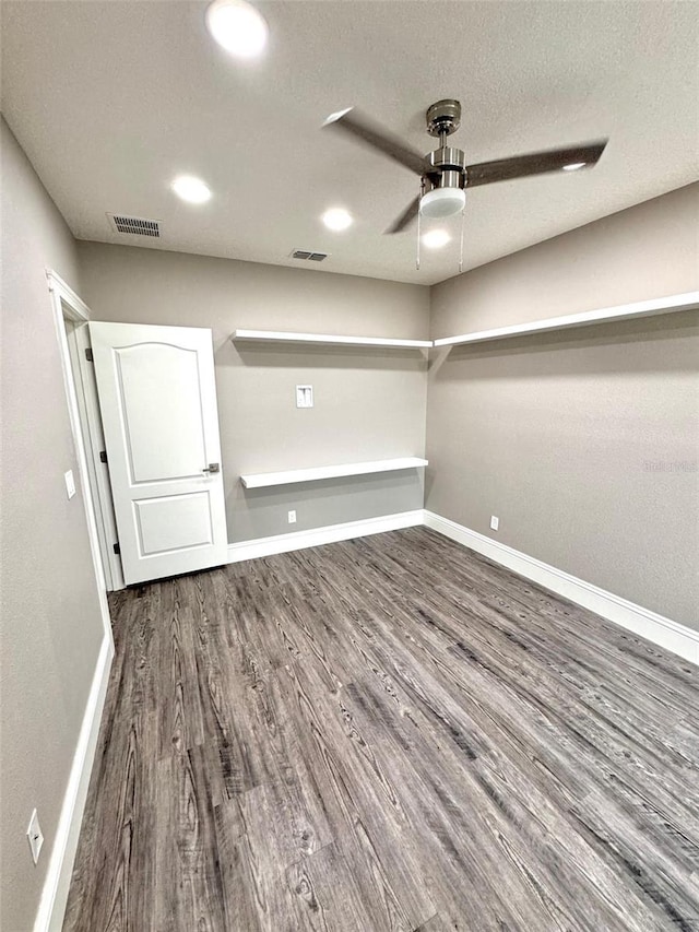 1147 Halapa Way, Trinity, FL 34655 - unfurnished room featuring wood finished floors, baseboards, a ceiling fan, and recessed lighting
