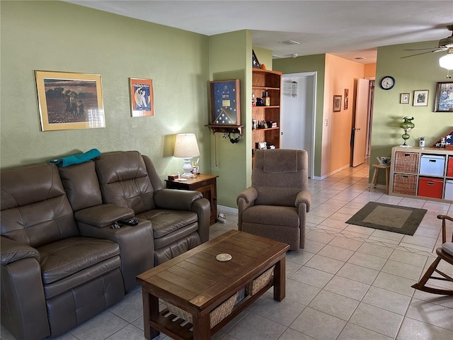 3827 15th Ave N, Saint Petersburg, FL 33713 - living area with light tile patterned floors, a ceiling fan, and baseboards