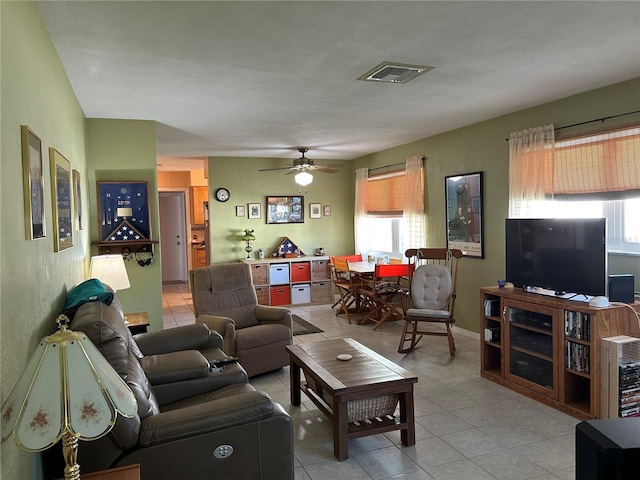 3827 15th Ave N, Saint Petersburg, FL 33713 - living area featuring light tile patterned floors and a ceiling fan