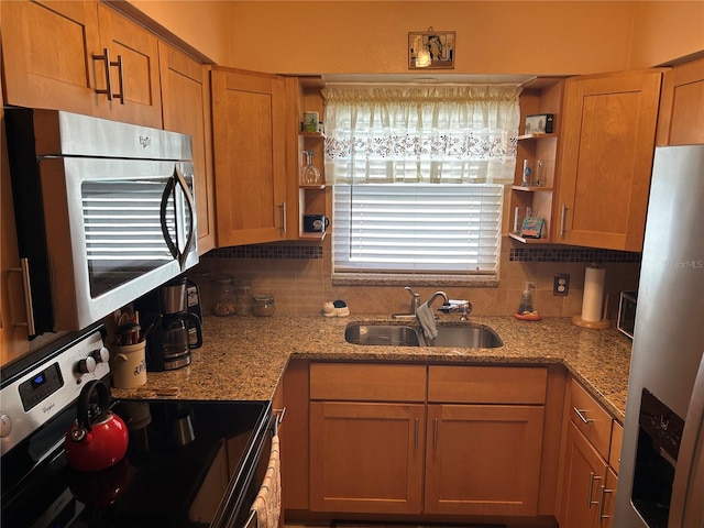 3827 15th Ave N, Saint Petersburg, FL 33713 - kitchen featuring a sink, appliances with stainless steel finishes, open shelves, and tasteful backsplash