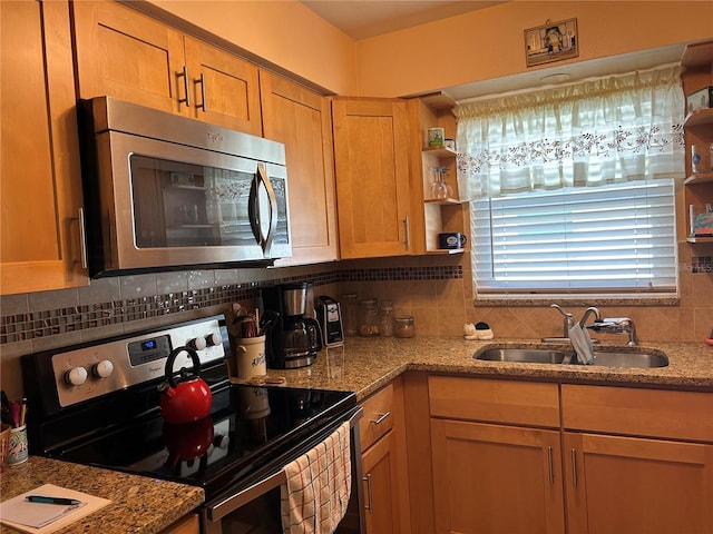 3827 15th Ave N, Saint Petersburg, FL 33713 - kitchen featuring stainless steel appliances, a sink, open shelves, and tasteful backsplash
