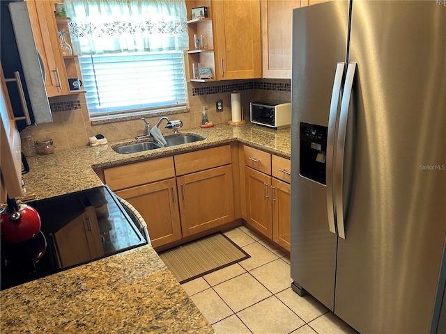 3827 15th Ave N, Saint Petersburg, FL 33713 - kitchen featuring stainless steel refrigerator with ice dispenser, a sink, open shelves, decorative backsplash, and light tile patterned floors