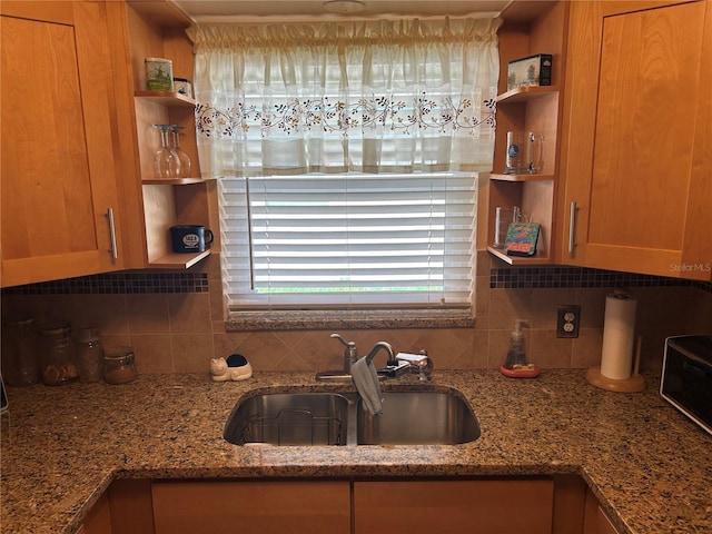 3827 15th Ave N, Saint Petersburg, FL 33713 - kitchen featuring open shelves, a sink, and backsplash