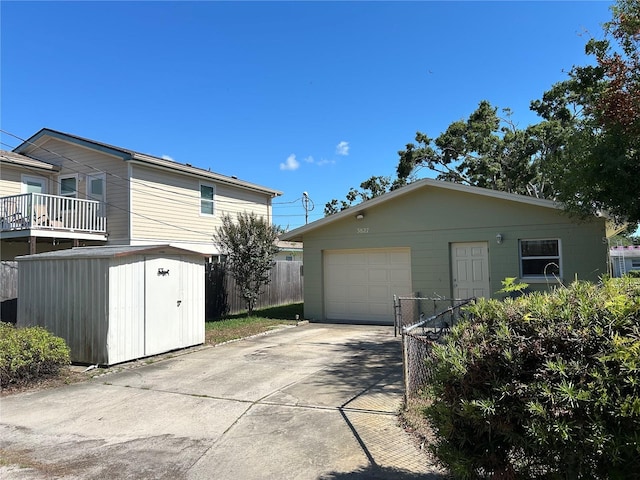 3827 15th Ave N, Saint Petersburg, FL 33713 - view of property exterior with an outbuilding, driveway, fence, and a shed