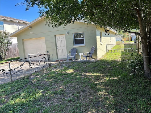 3827 15th Ave N, Saint Petersburg, FL 33713 - back of house featuring an attached garage