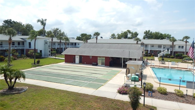 4744 Azalea Dr Unit 203B, New Port Richey, FL 34652 - view of property's community featuring shuffleboard and a pool