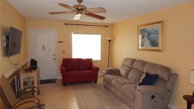 4744 Azalea Dr Unit 203B, New Port Richey, FL 34652 - living area with ceiling fan, light tile patterned flooring, and baseboards