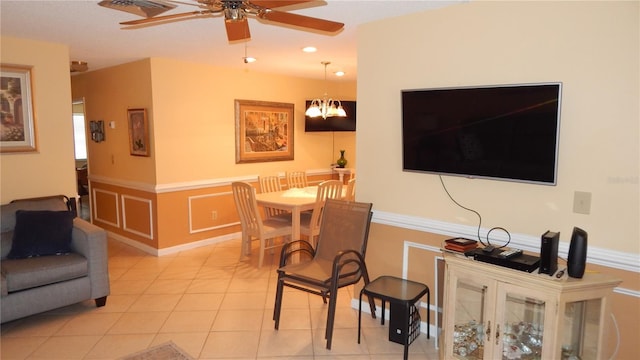 4744 Azalea Dr Unit 203B, New Port Richey, FL 34652 - living area with ceiling fan, wainscoting, light tile patterned flooring, a chandelier, and recessed lighting