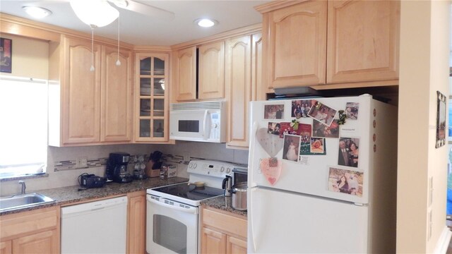 4744 Azalea Dr Unit 203B, New Port Richey, FL 34652 - kitchen with white appliances, light brown cabinetry, a sink, glass insert cabinets, and recessed lighting