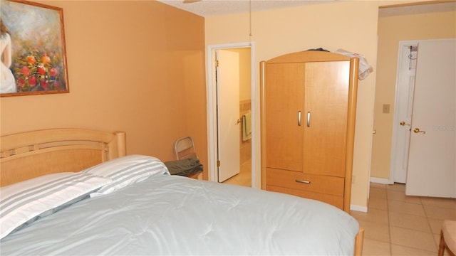 4744 Azalea Dr Unit 203B, New Port Richey, FL 34652 - bedroom featuring light tile patterned flooring