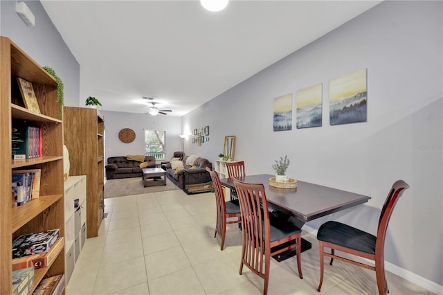 842 Tennyson Mill Cir, Tampa, FL 33619 - dining space featuring a ceiling fan and light tile patterned floors