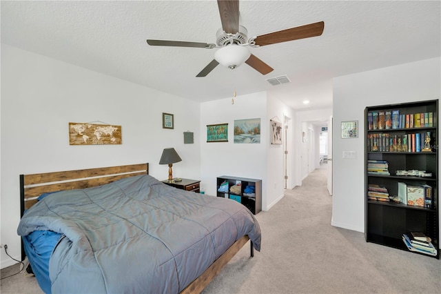 842 Tennyson Mill Cir, Tampa, FL 33619 - bedroom with carpet flooring, a ceiling fan, baseboards, and a textured ceiling