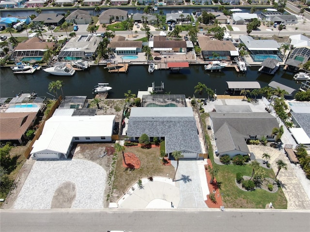 aerial view of residential area with a nearby body of water