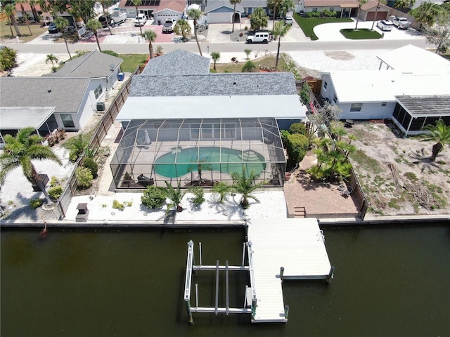 aerial view of residential area featuring a pool