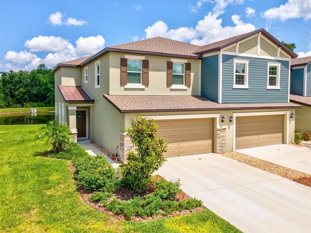17729 Nectar Flume Dr, Land O Lakes, FL 34638 - multi unit property with stucco siding, driveway, an attached garage, and roof with shingles