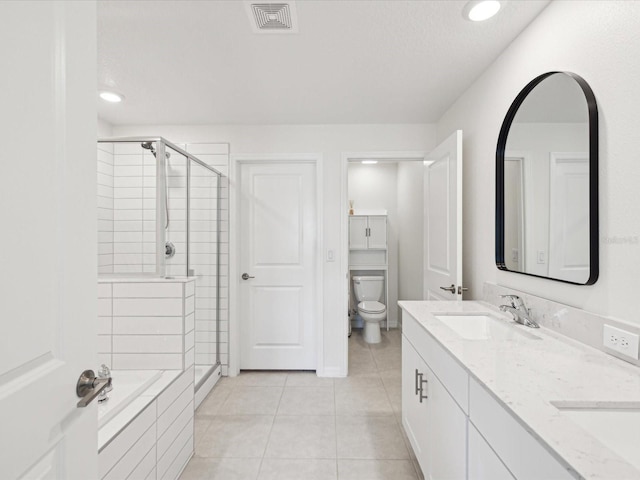 17729 Nectar Flume Dr, Land O Lakes, FL 34638 - bathroom with a stall shower, tile patterned floors, toilet, double vanity, and recessed lighting