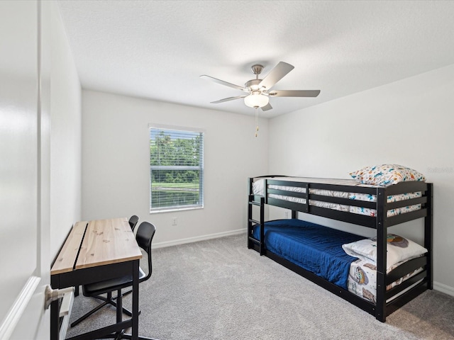 17729 Nectar Flume Dr, Land O Lakes, FL 34638 - carpeted bedroom with baseboards, an office area, and a ceiling fan