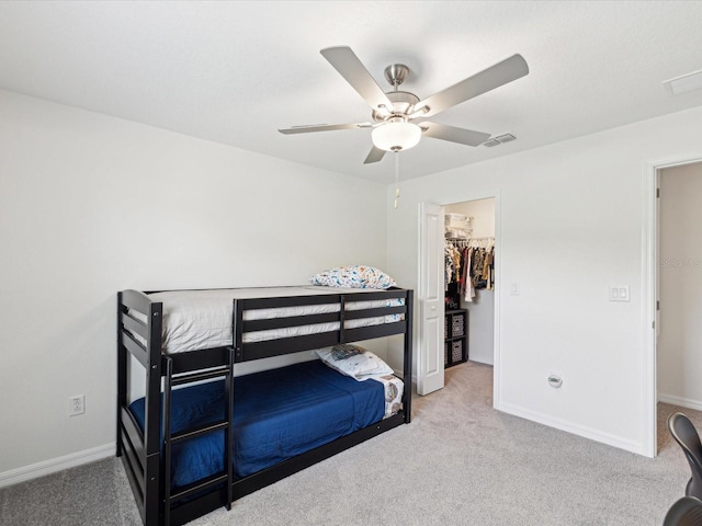 17729 Nectar Flume Dr, Land O Lakes, FL 34638 - bedroom featuring carpet floors, a spacious closet, and baseboards